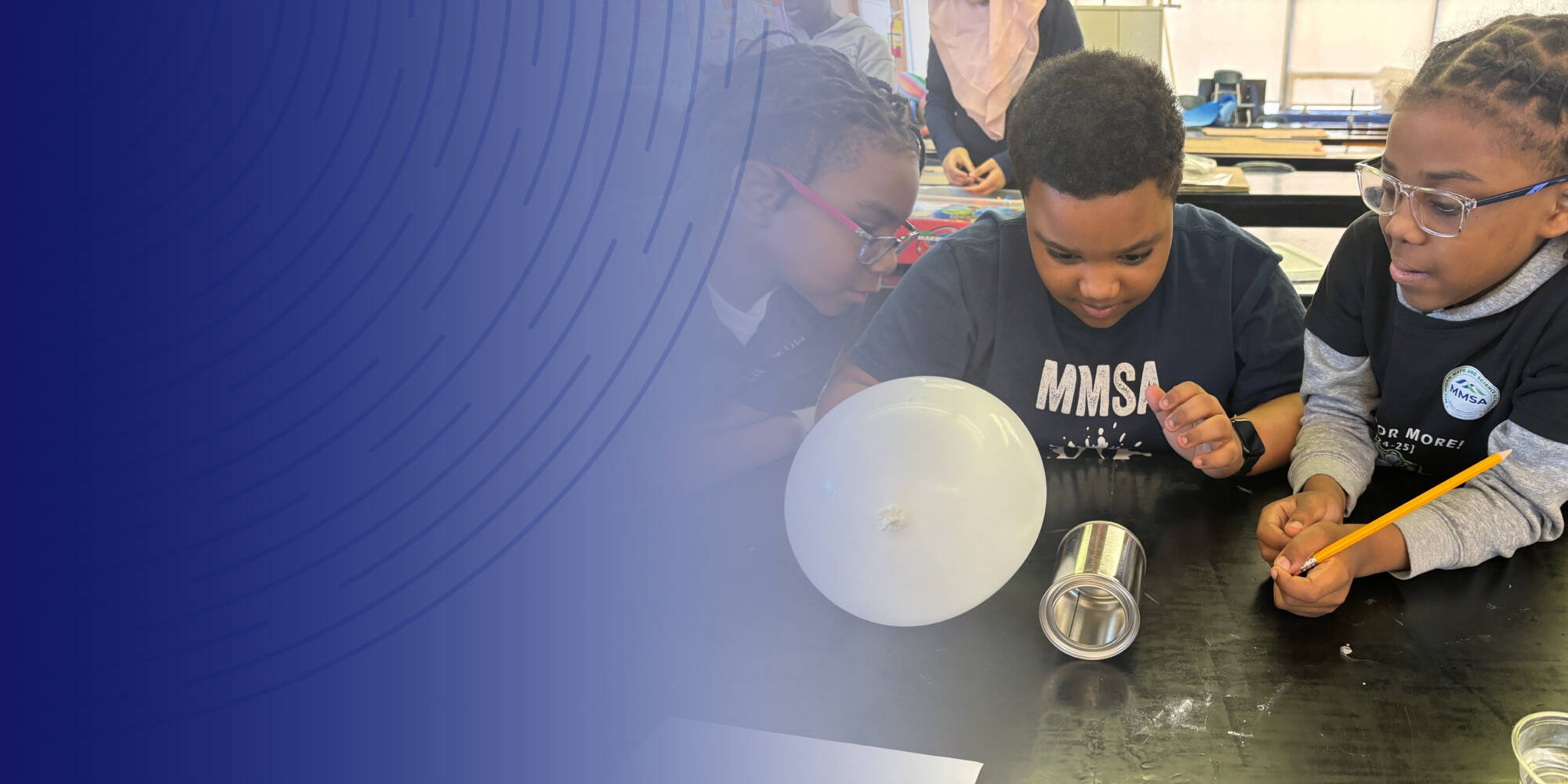 Three Michigan Math & Science Academy students conduct a science experiment.